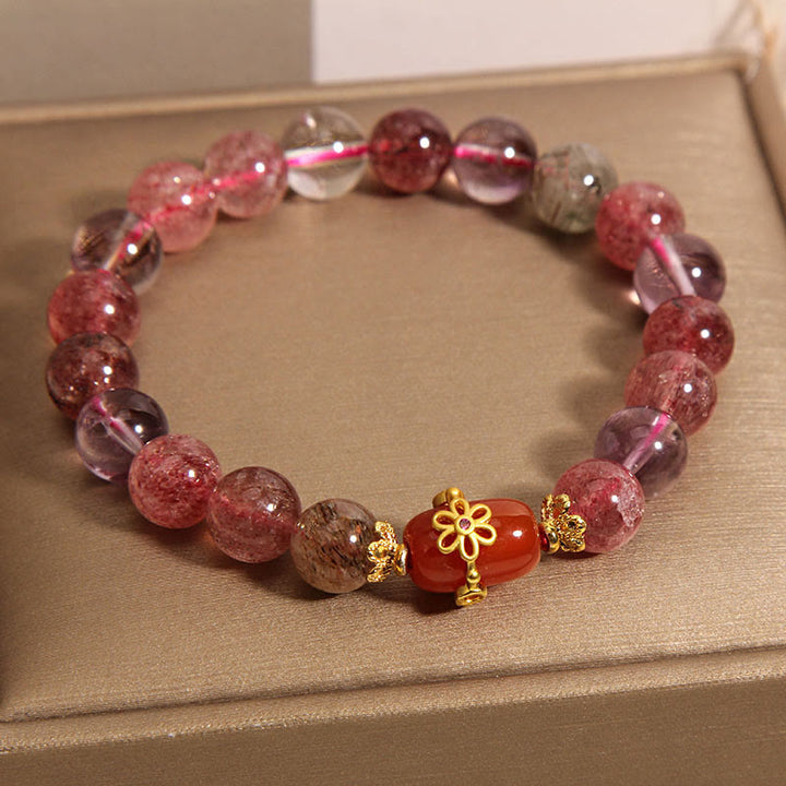 Naturalna bransoletka z kryształów Super Seven z czerwonego agatu z Buddha Stones