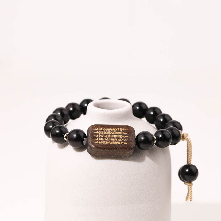 Bransoletka z grawerowanym pismem pokoju z Buddha Stones z drewna hebanowego
