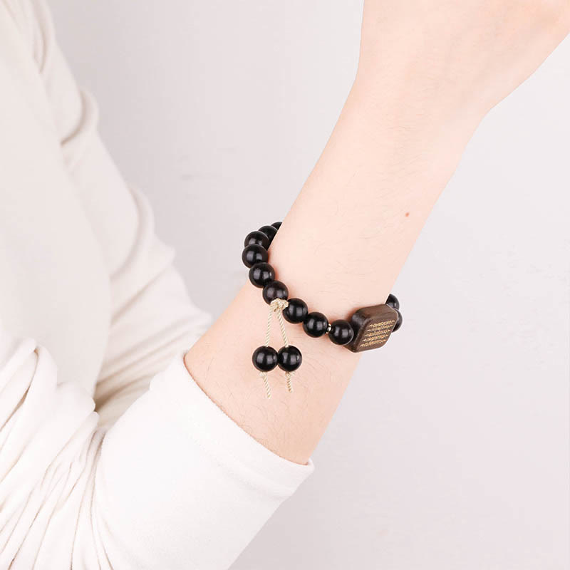 Bransoletka z grawerowanym pismem pokoju z Buddha Stones z drewna hebanowego