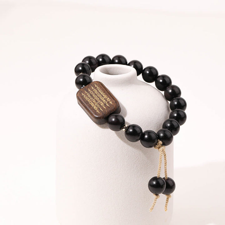 Bransoletka z grawerowanym pismem pokoju z Buddha Stones z drewna hebanowego