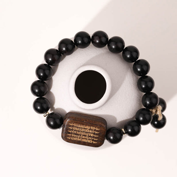 Bransoletka z grawerowanym pismem pokoju z Buddha Stones z drewna hebanowego