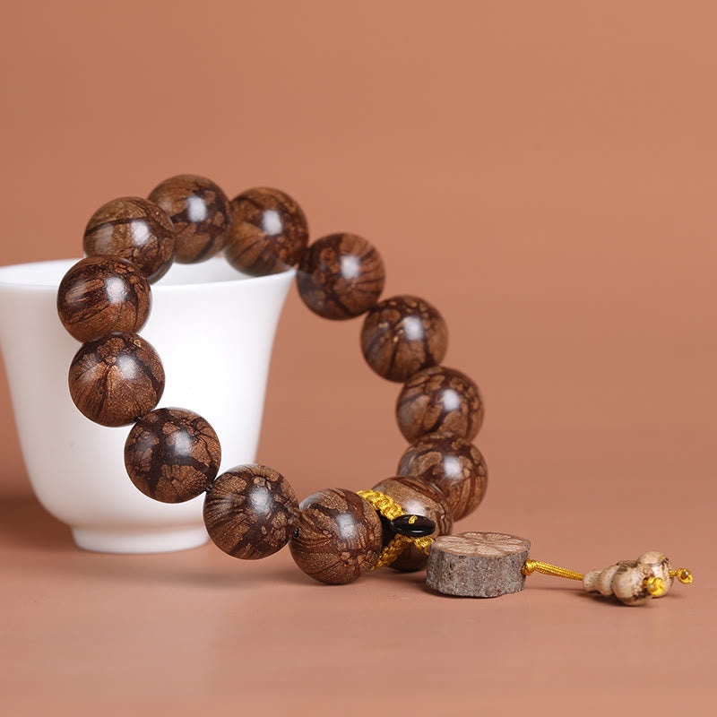 Bransoletka Buddha Stones Plum Blossom Wood Inner Peace
