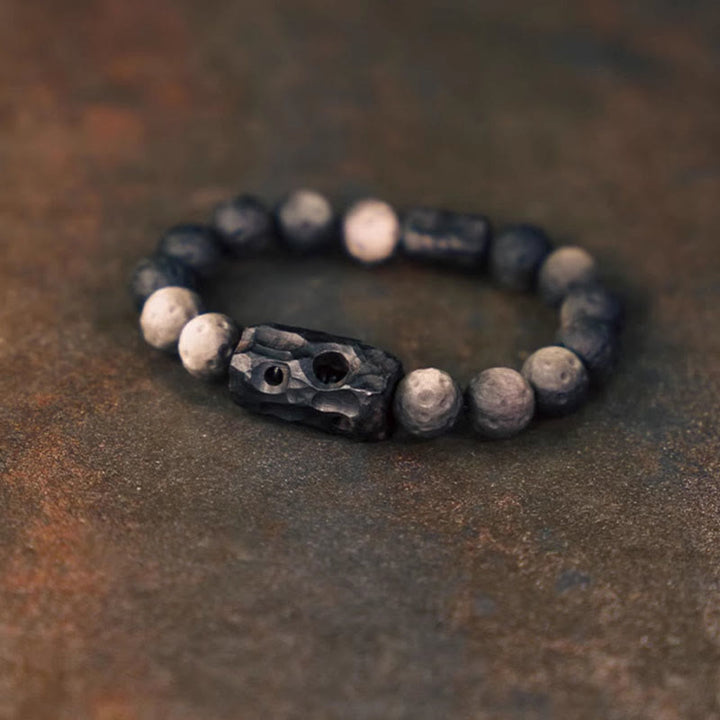 Bransoletka uspokajająca z Buddha Stones w kolorze srebrnym i obsydianem z drewna hebanowego