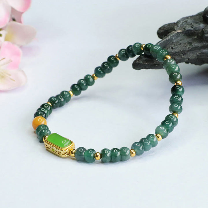 Bransoletka szczęścia z naturalnego zielonego jadeitu i topazu Buddha Stones
