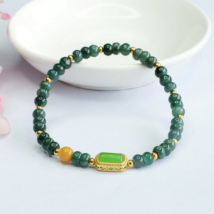 Bransoletka szczęścia z naturalnego zielonego jadeitu i topazu Buddha Stones
