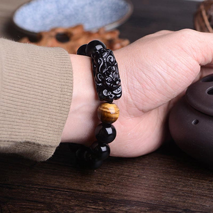 Buddha Stones Naturalny Czarny Obsydian PiXiu Tygrysie Oko Bransoletka Siłowa