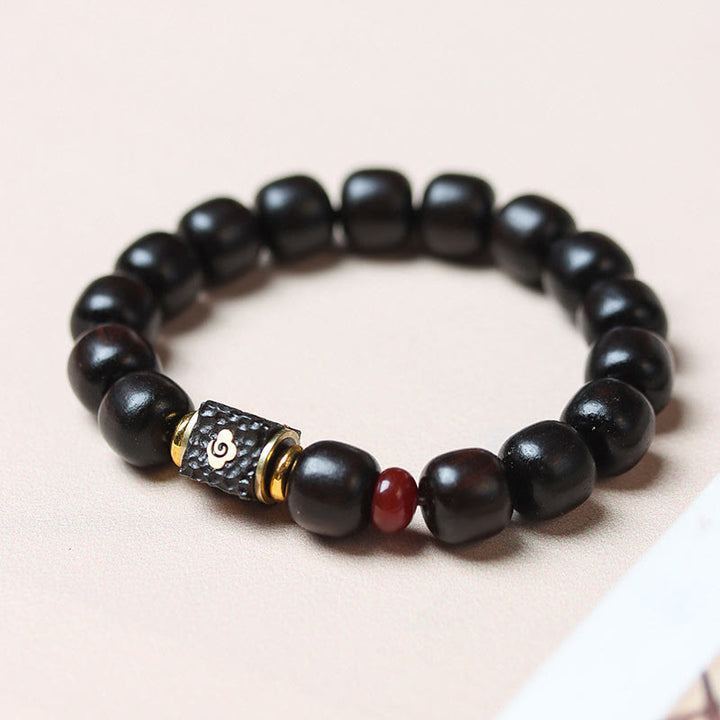 Bransoletka Buddha Stones Ebony Drewno Pomyślne Chmury Grawerowane Spokojne