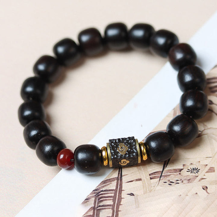 Bransoletka Buddha Stones Ebony Drewno Pomyślne Chmury Grawerowane Spokojne