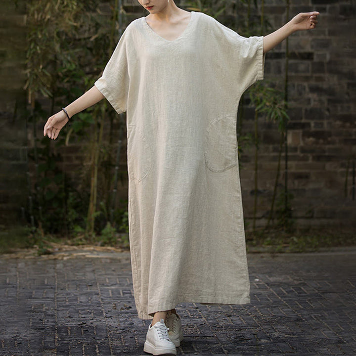 Sukienka midi z ramią lnianą z dekoltem w serek i kieszeniami Buddha Stones w jednolitym kolorze z krótkim rękawem - image 1