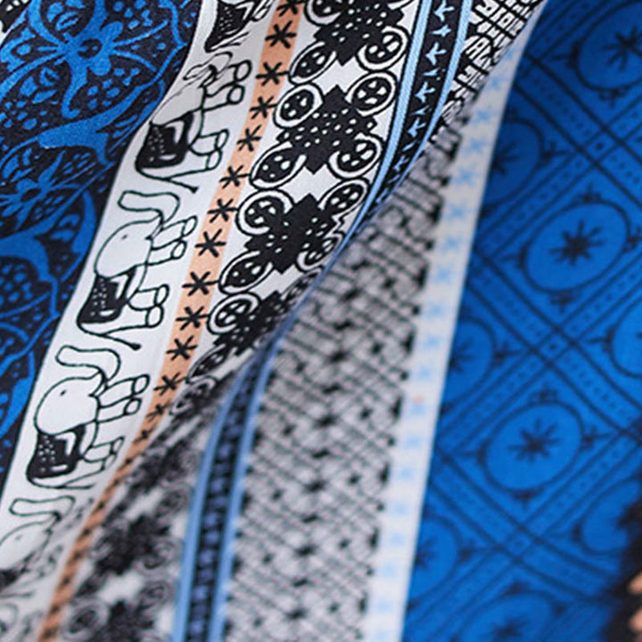 Sukienka midi z krótkim rękawem i kieszeniami w kolorze czarnym i niebieskim z Buddha Stones - image 8