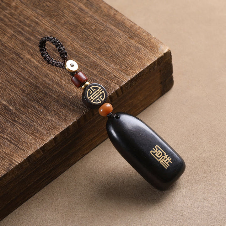 Buddha Stones Mały liść Czerwony sandałowiec Drewno hebanowe Pokój Pomyślna Miedź Moneta Ochrona Brelok