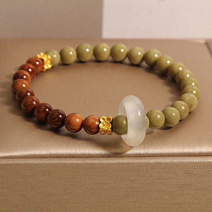 Naturalna bransoletka Buddha Stones Alashan Agate Kuka Seed Encourage