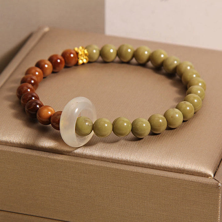 Naturalna bransoletka Buddha Stones Alashan Agate Kuka Seed Encourage