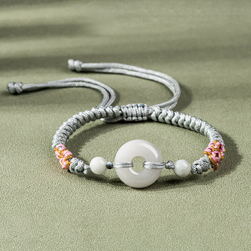 Bransoletka z czerwonego sznurka z jadeitu i Buddha Stones
