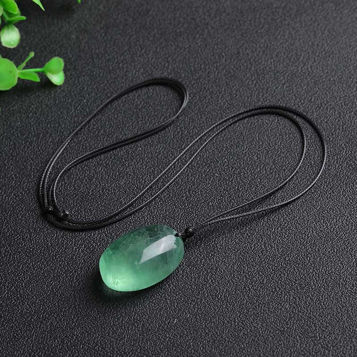 Wisiorek z zielonego fluorytu i Buddha Stones