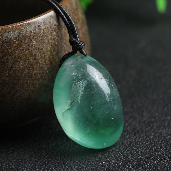 Wisiorek z zielonego fluorytu i Buddha Stones