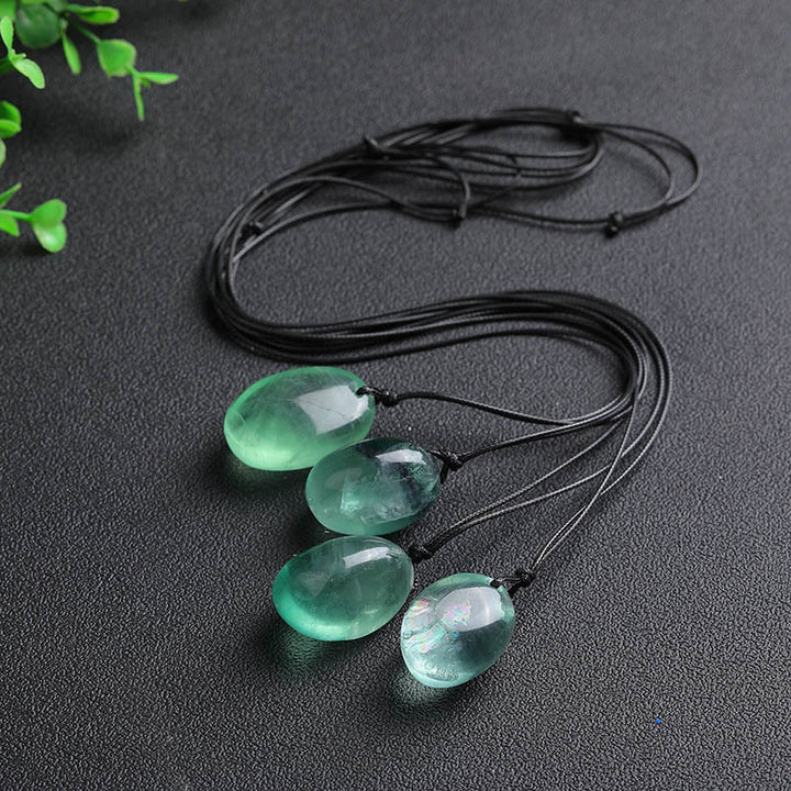 Wisiorek z zielonego fluorytu i Buddha Stones