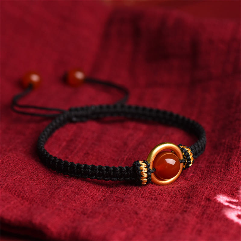 Bransoletka z Buddha Stones z czerwonego agatu i klamrą Peace Calm Rope