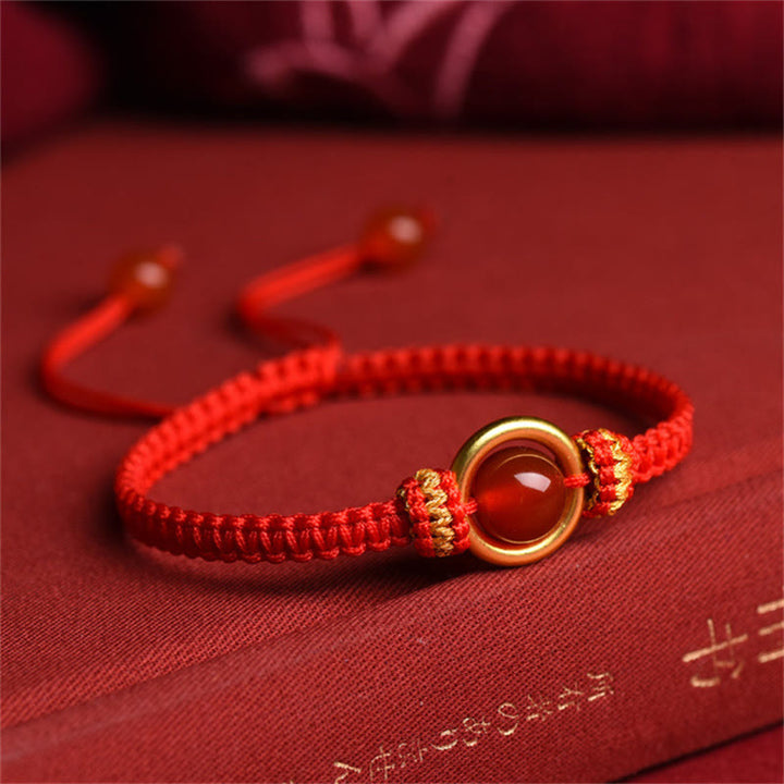 Bransoletka z Buddha Stones z czerwonego agatu i klamrą Peace Calm Rope