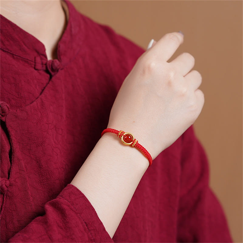 Bransoletka z Buddha Stones z czerwonego agatu i klamrą Peace Calm Rope