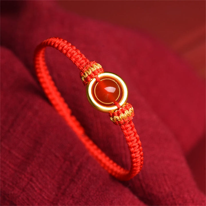 Bransoletka z Buddha Stones z czerwonego agatu i klamrą Peace Calm Rope