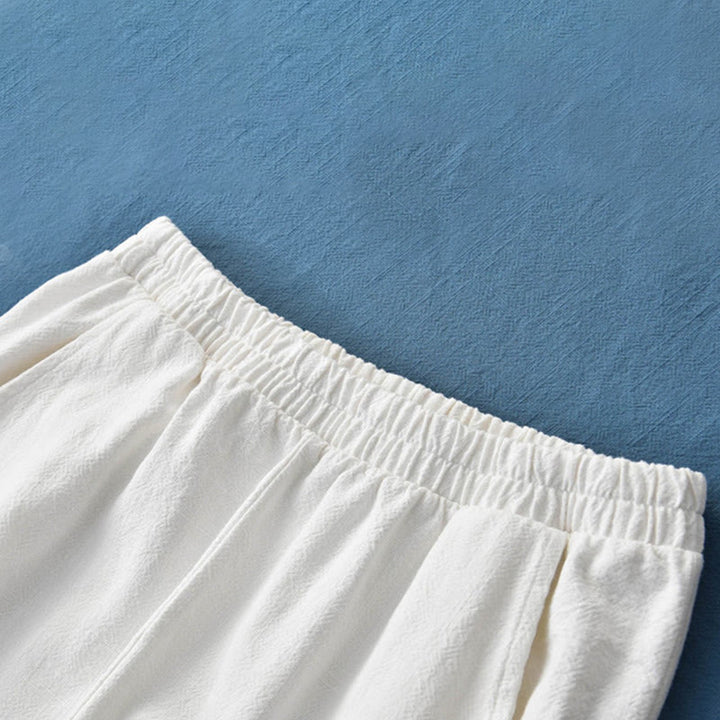 Buddha Stones Spodnie z gładkiej bawełny z ramią i kieszeniami - image 29