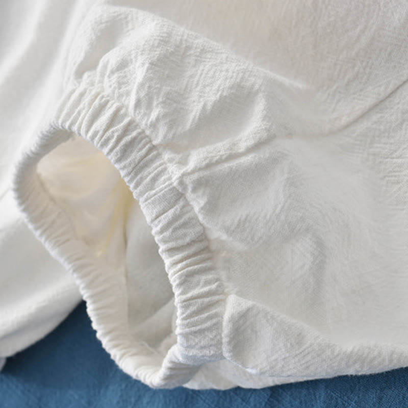 Buddha Stones Spodnie z gładkiej bawełny z ramią i kieszeniami - image 31