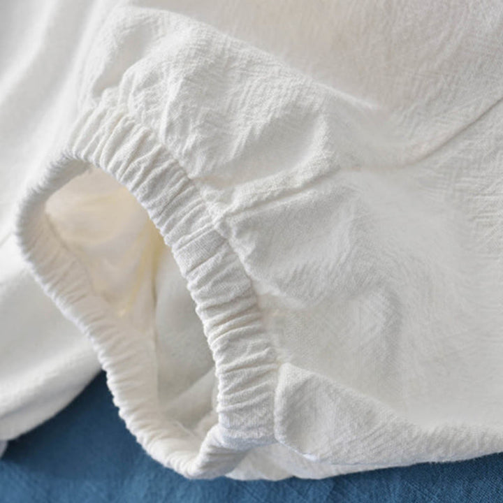 Buddha Stones Spodnie z gładkiej bawełny z ramią i kieszeniami - image 31