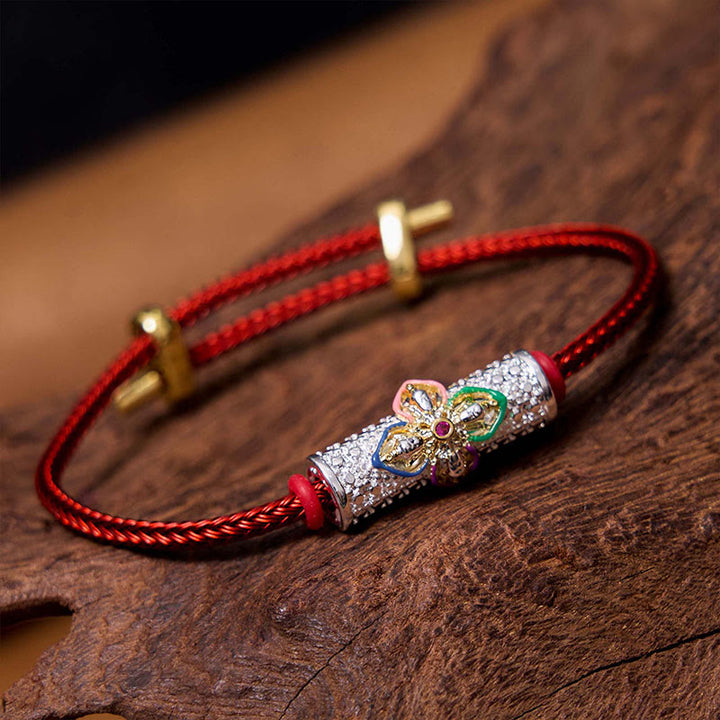 Bransoletka z czerwonego sznurka z miedzianymi Buddha Stones