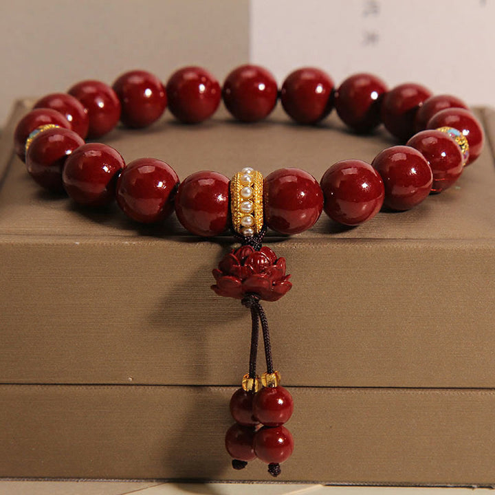 Bransoletka z zawieszkami Buddha Stones Cinnabar Lotus Blessing Charm