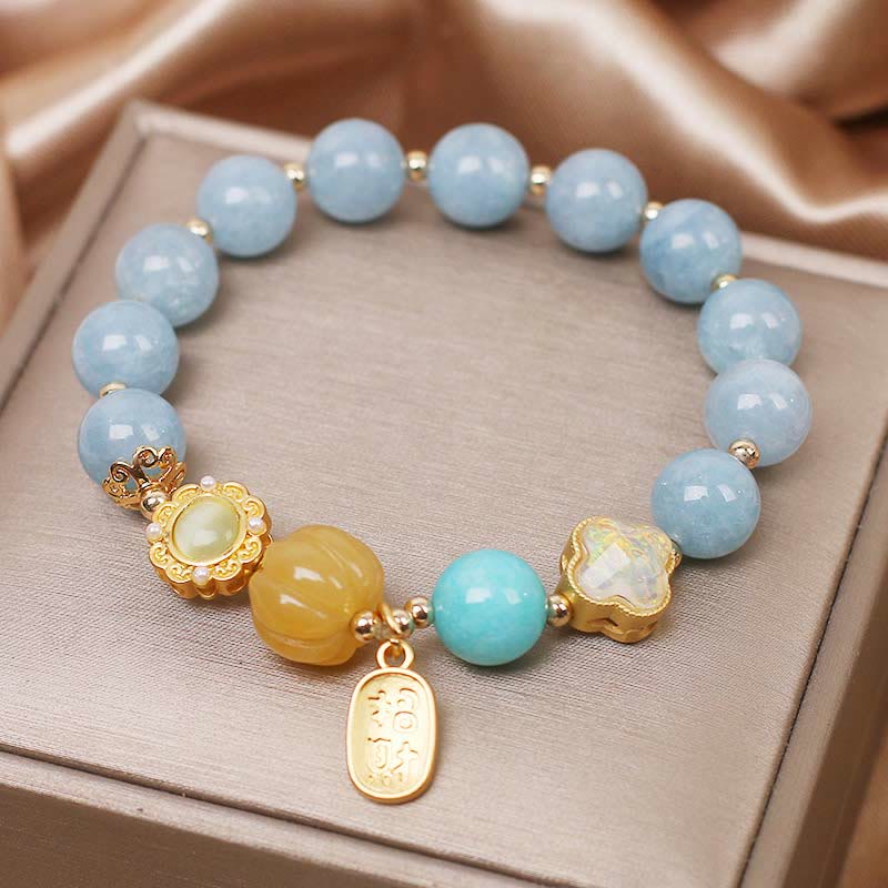 Bransoletka chroniąca bogactwo z Buddha Stones, akwamarynu i dyni