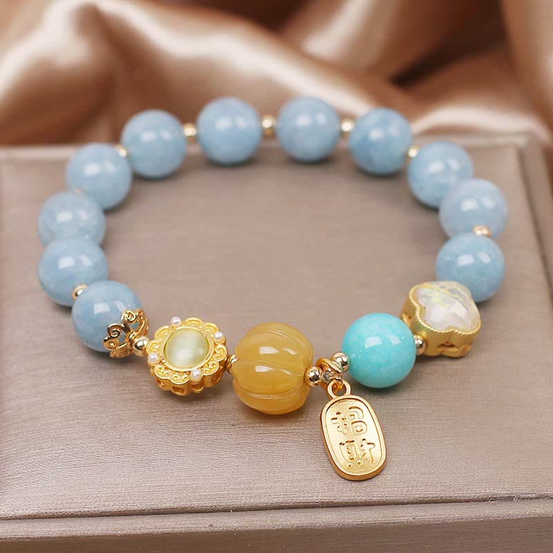 Bransoletka chroniąca bogactwo z Buddha Stones, akwamarynu i dyni