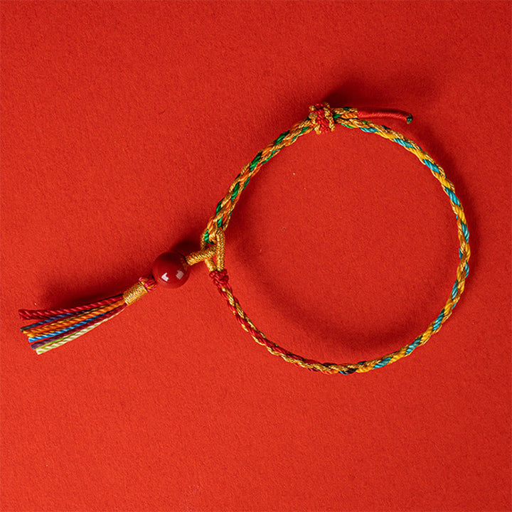 Bransoletka z kolorowych sznurków Cinnabar z Buddha Stones