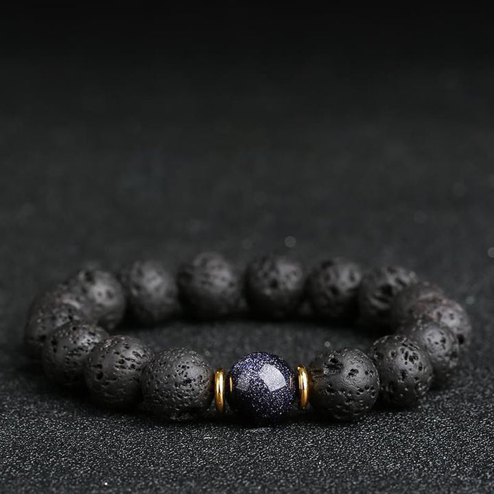 Bransoletka lecznicza z Buddha Stones , kamieniami lawowymi, kamieniami złotymi i niebieskim piaskowcem