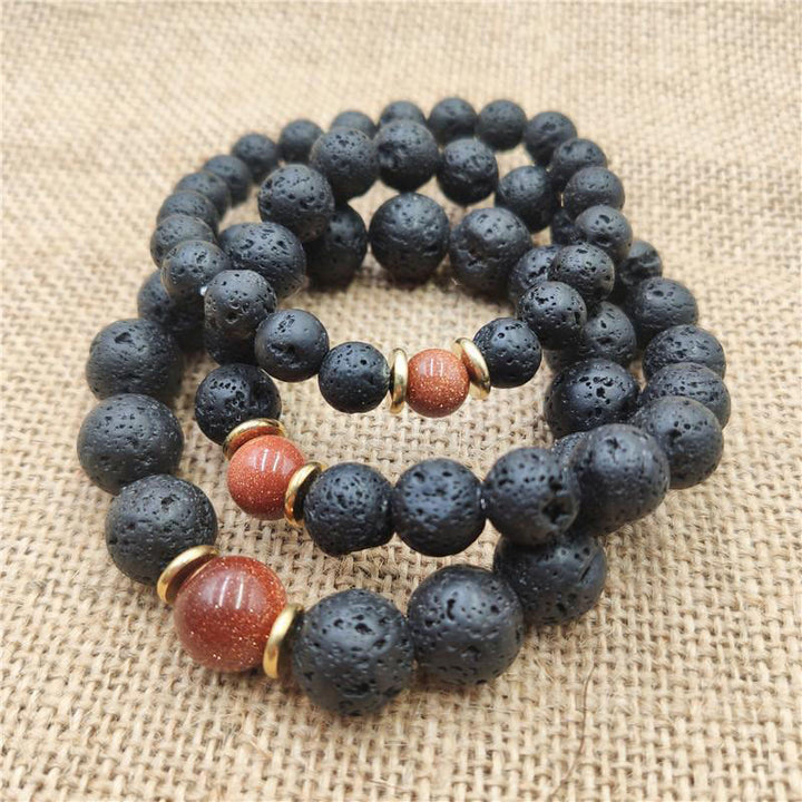 Bransoletka lecznicza z Buddha Stones , kamieniami lawowymi, kamieniami złotymi i niebieskim piaskowcem