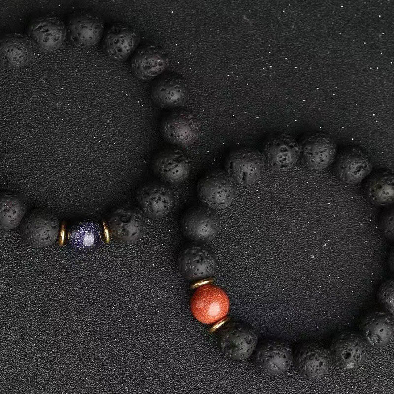 Bransoletka lecznicza z Buddha Stones , kamieniami lawowymi, kamieniami złotymi i niebieskim piaskowcem