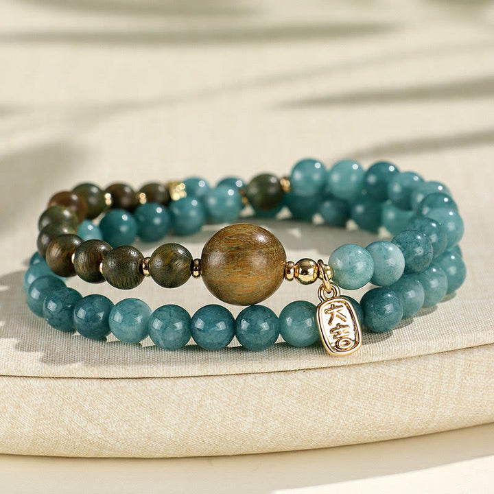 Buddha Stones Niebieski Chalcedon Zielone Drzewo Sandałowe Mały Liść Czerwone Drzewo Sandałowe Podwójnie Owijana Bransoletka Emocjonalna Równowaga