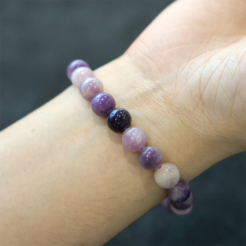 Bransoletka z Buddha Stones z fioletowym kamieniem miki