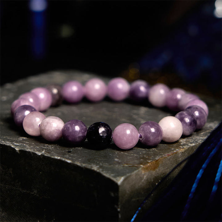 Bransoletka z Buddha Stones z fioletowym kamieniem miki