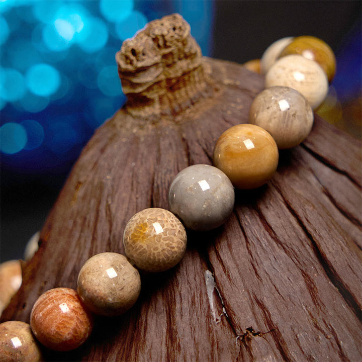Bransoletka z Buddha Stones i skamieniałego korala