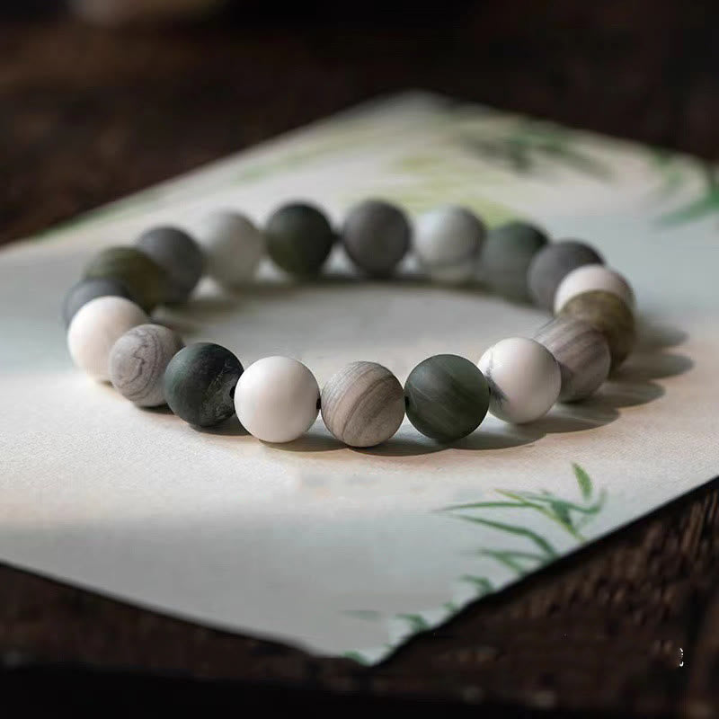 Bransoletka z Buddha Stones , białego turkusu, jaspisu Picasso i zielonego kalcytu, błogosławieństwo