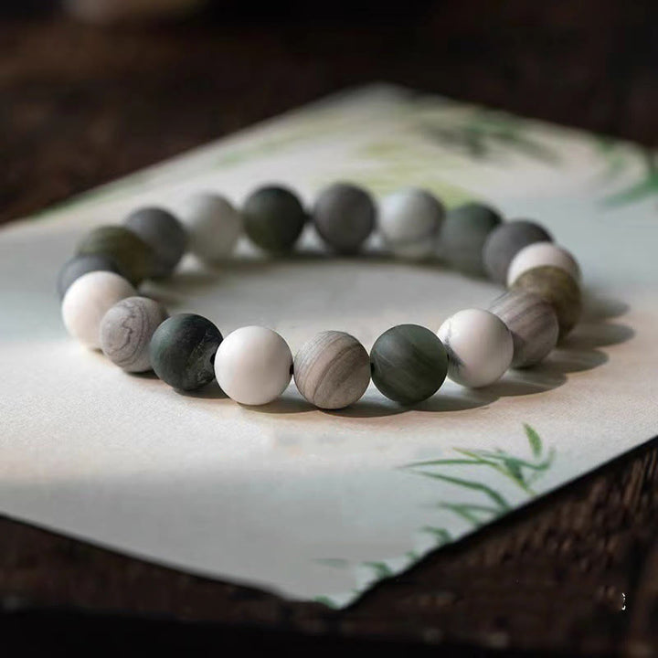 Bransoletka z Buddha Stones , białego turkusu, jaspisu Picasso i zielonego kalcytu, błogosławieństwo