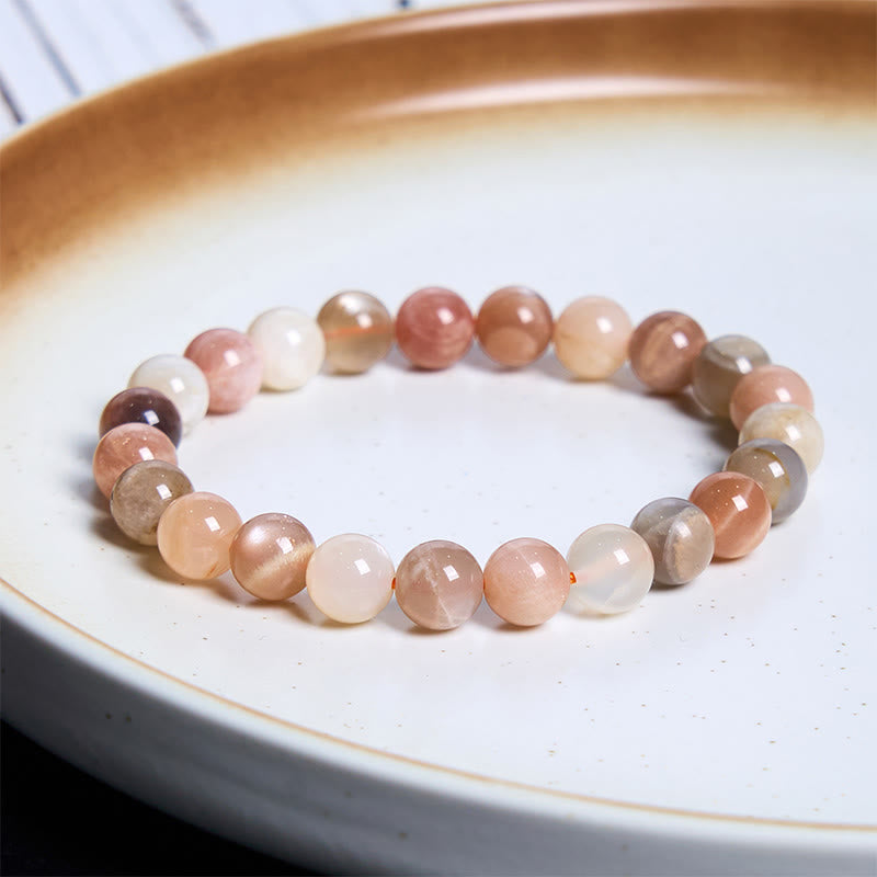Bransoletka lecznicza z Buddha Stones i brzoskwiniowym kamieniem księżycowym