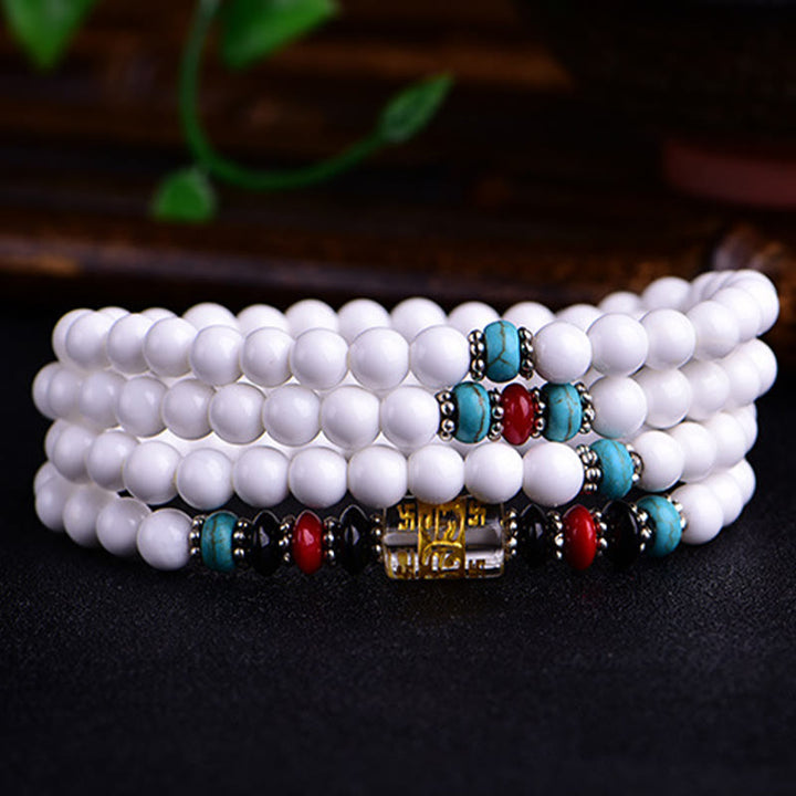 Buddha Stones 108 Mala Koraliki Biała Porcelana Sześć Prawdziwych Słów ' Om Mani Padme Hum' Bransoletka Cierpliwości