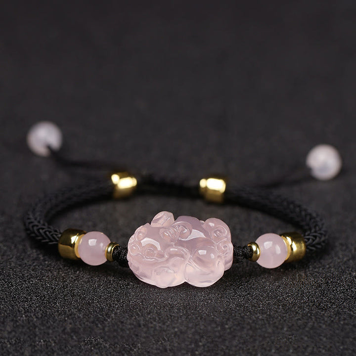 Bransoletka z różowym kryształem i Buddha Stones PiXiu Wealth String Braided