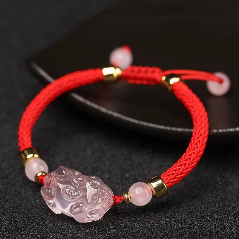 Bransoletka z różowym kryształem i Buddha Stones PiXiu Wealth String Braided