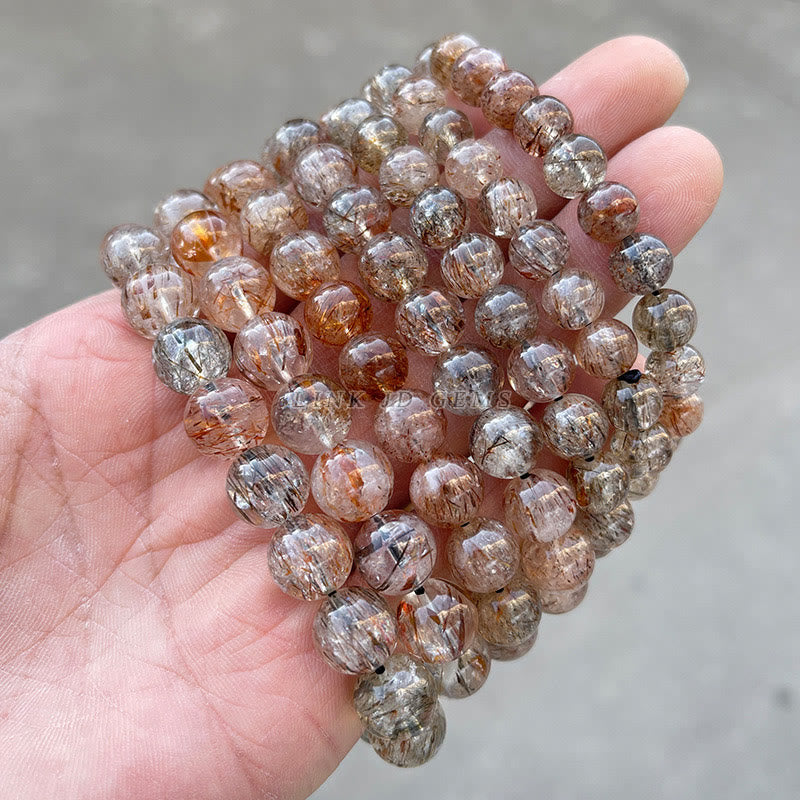 Naturalna bransoletka z Buddha Stones Super Seven, która zapewnia pozytywny wzrost