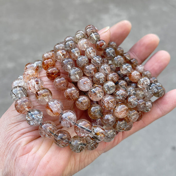 Naturalna bransoletka z Buddha Stones Super Seven, która zapewnia pozytywny wzrost