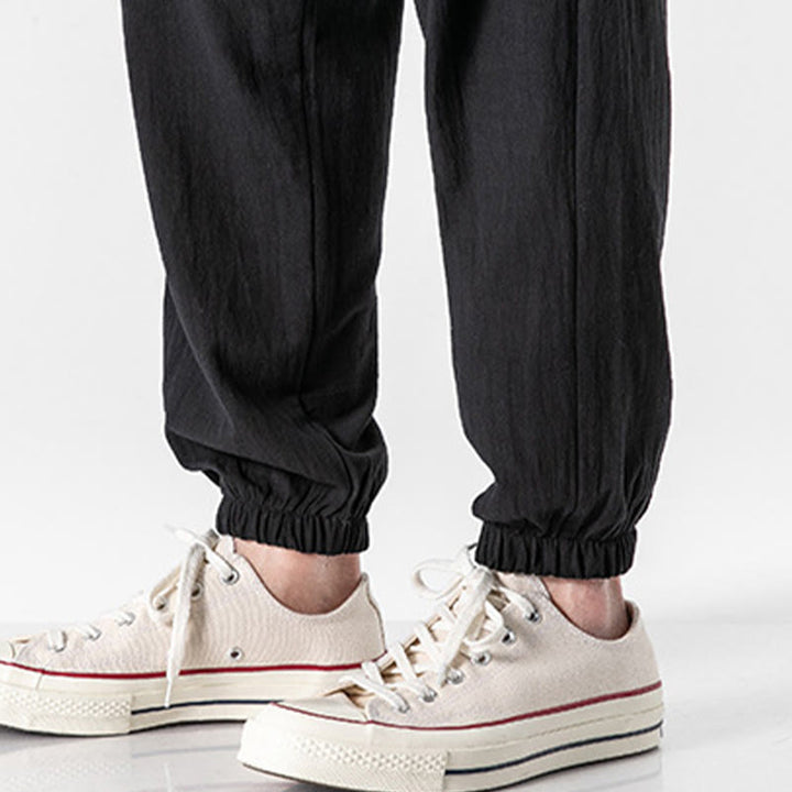 Spodnie męskie z kieszeniami i ściągaczem z bawełny Buddha Stones w jednolitym kolorze - image 15