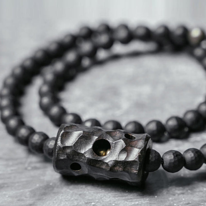 Bransoletka ochronna z podwójnym owinięciem z Buddha Stones o mrożonej powierzchni i czarnym onyksie z hebanu
